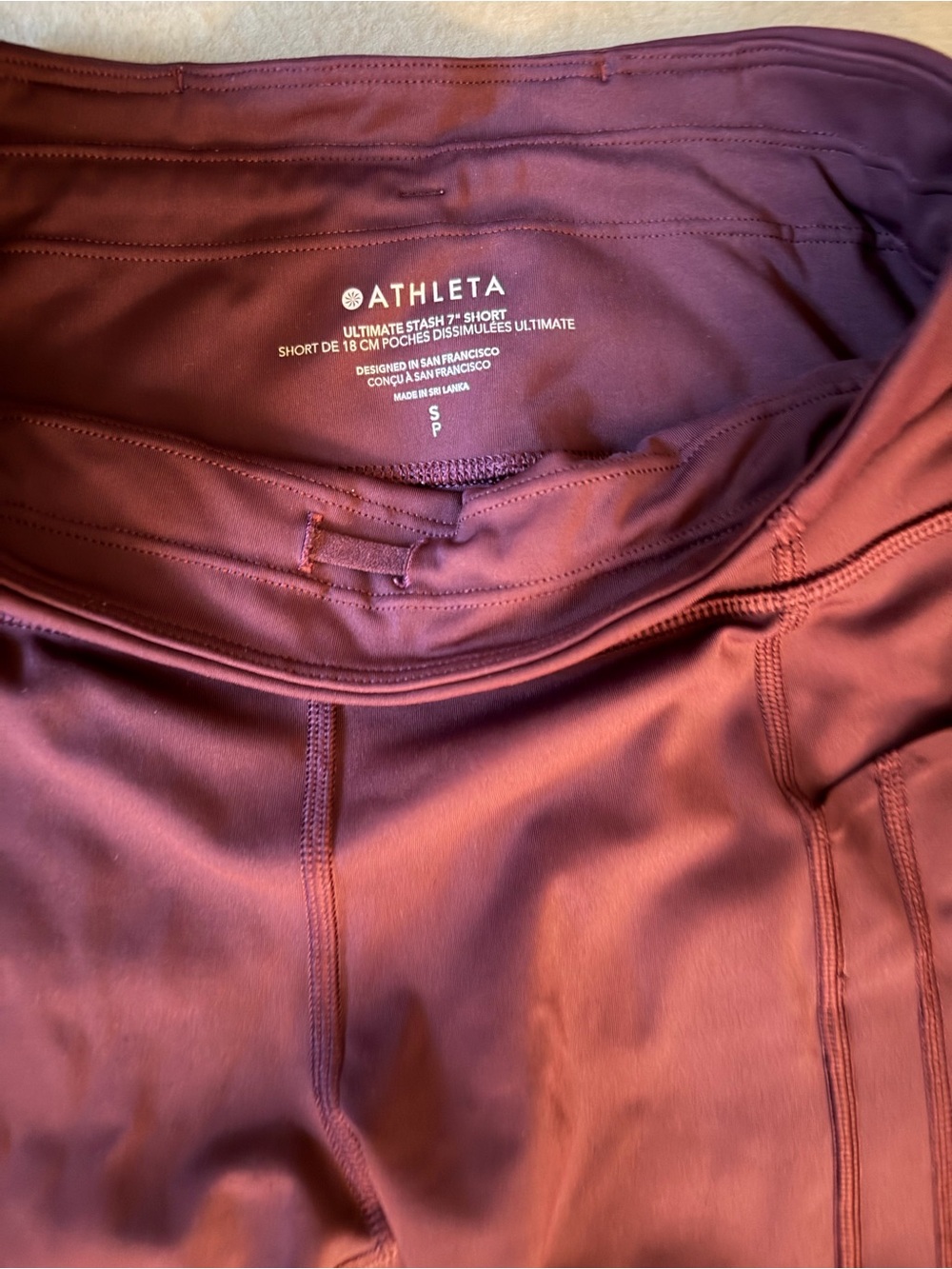 Athleta Plum High-Rise Bike Shorts with Side Pockets - Picture 2 of 3